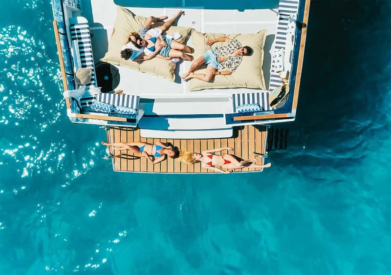 Mallorca: Palma Boat Tour & Snorkeling with Drink Included - Music, sangría, and the bar onboard