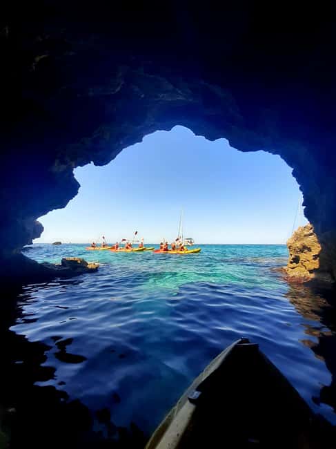 Mallorca: Sea Cave Kayaking Tour with Snorkeling and a Snack - The first paddle along the cliffs