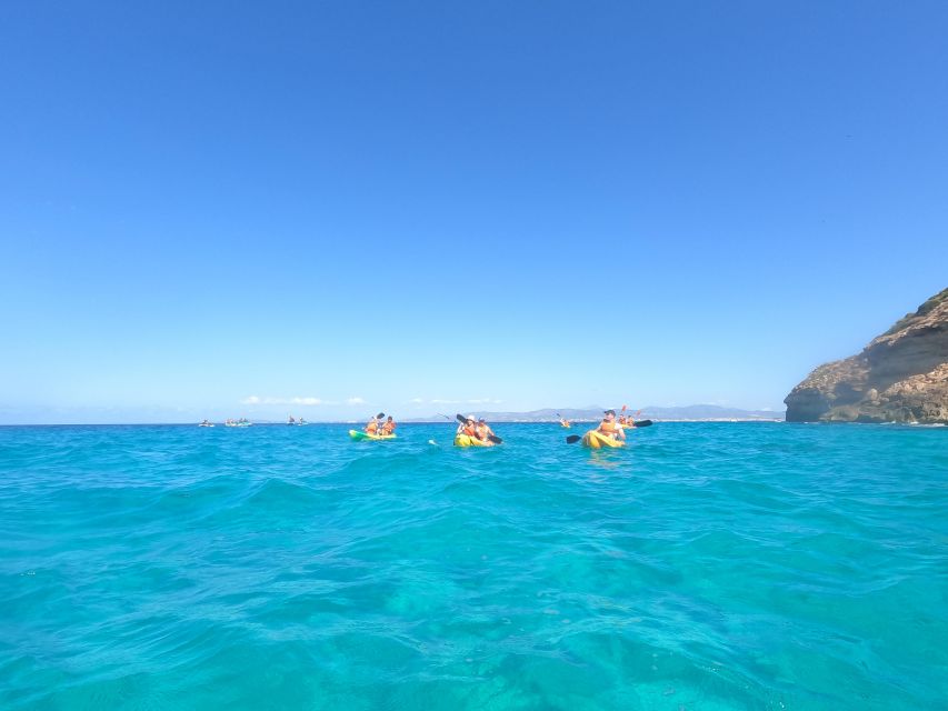 Mallorca: Sea Cave Kayaking Tour with Snorkeling and a Snack - Swimming, snorkeling, and Posidonia