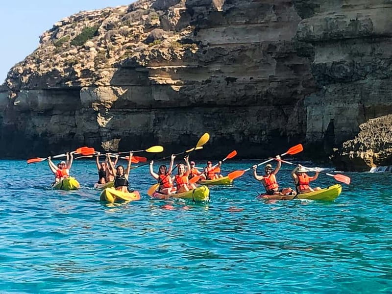 Mallorca: Sea Cave Kayaking Tour with Snorkeling and a Snack - The beach stop and sandwich break