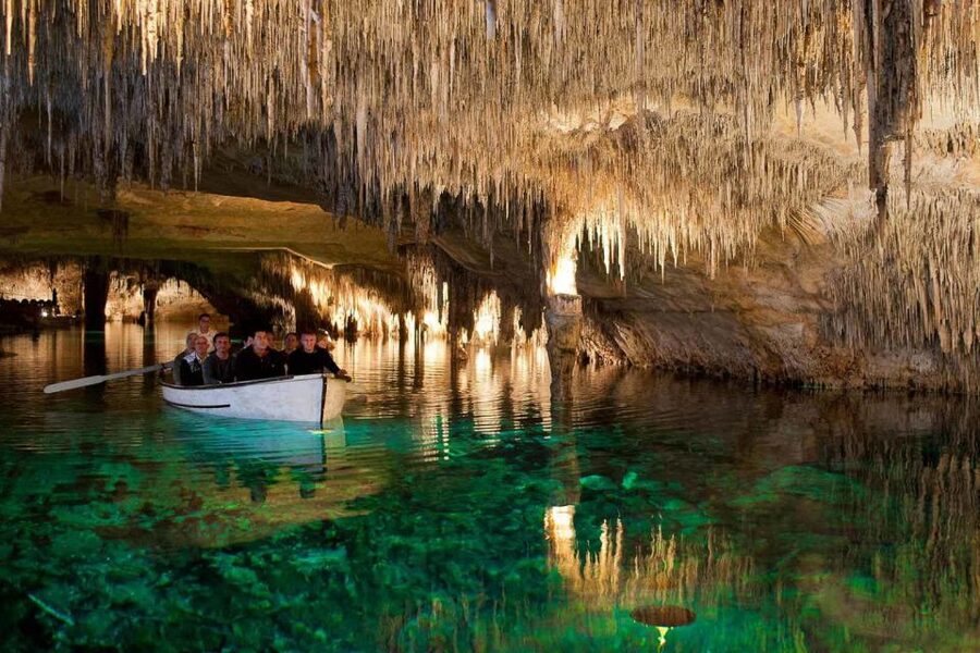 Mallorca: Ticket for Caves of Drach with Pickup Service - Boat ride or bridge across the lake