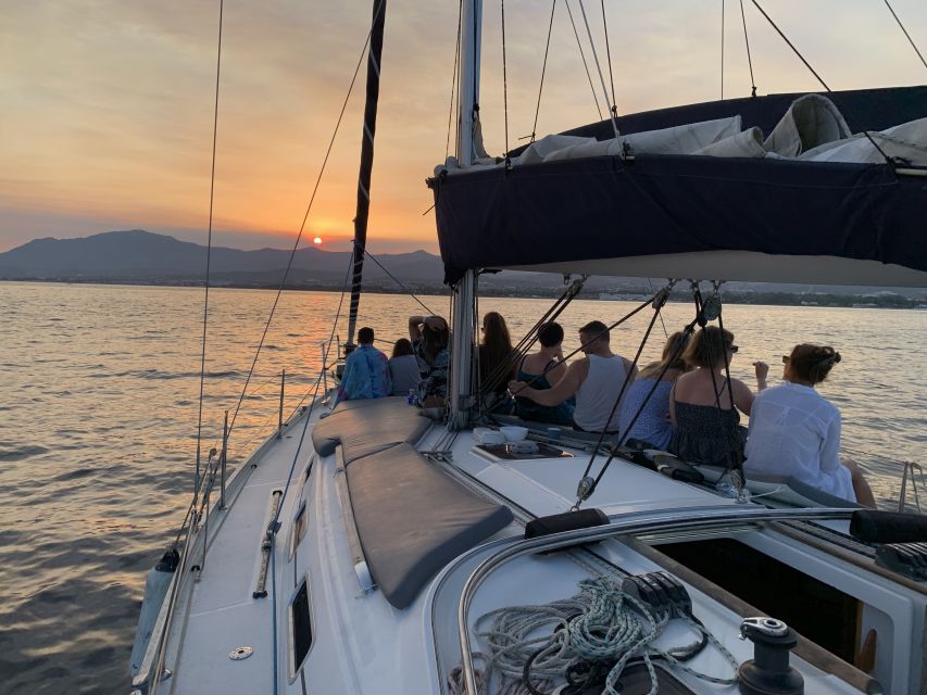 Marbella: Sunset Sailing Trip with Drinks and Snacks - Sunset views, photographs, and the best seat