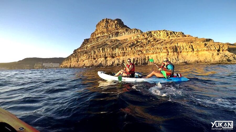 Mogán: Guided Kayak to Caves and Snorkeling Tour - Paddling under the white cliffs