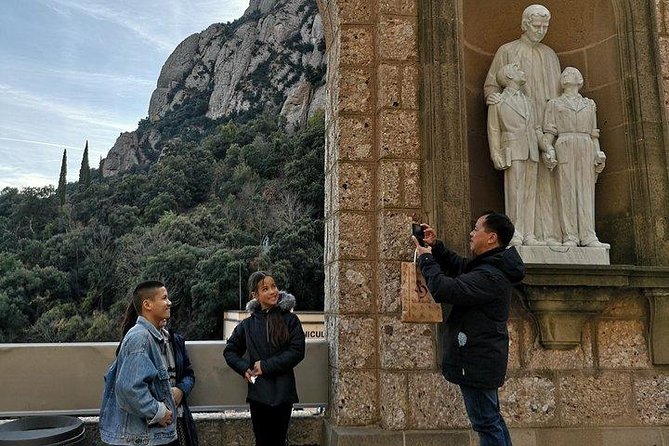 Montserrat Day Trip Private or Small Group with Basilica Tickets - Seeing Montserrat before entering the basilica