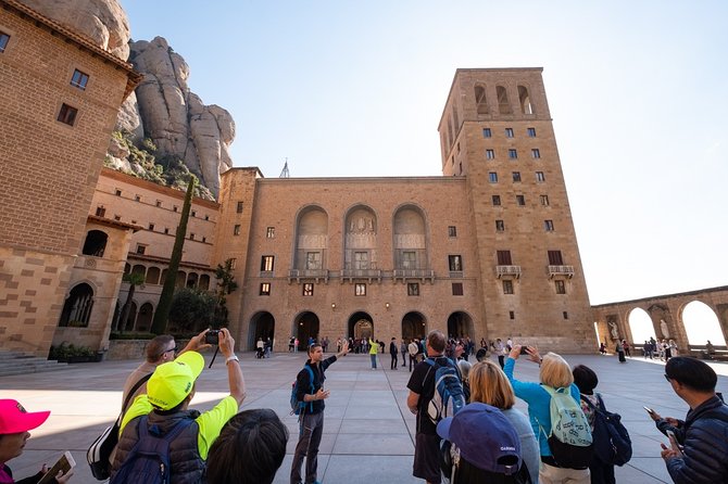 Montserrat Half Day with Cable Car and Easy Hike from Barcelona - Inside the Montserrat monastery and basilica