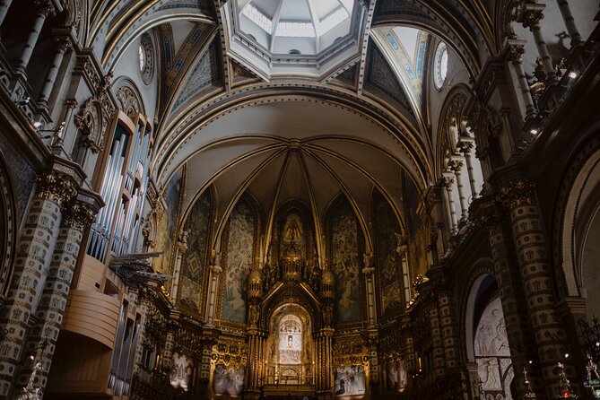 Montserrat Monastery Half Day Experience from Barcelona - Entering the Basilica and approaching La Moreneta