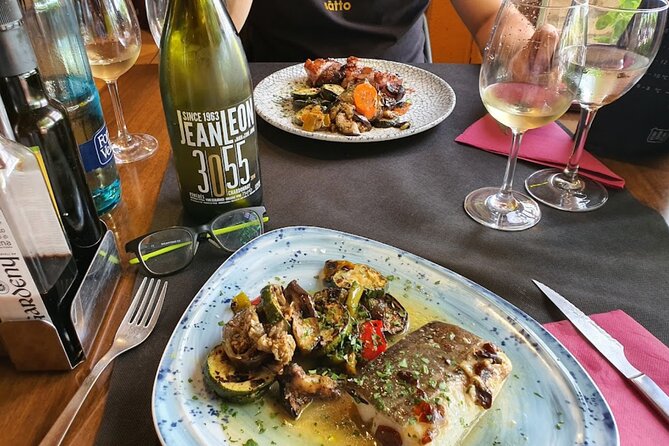 Montserrat & Winery Visit Tour with Traditional Farmhouse Lunch - A family winery and four Catalan pours