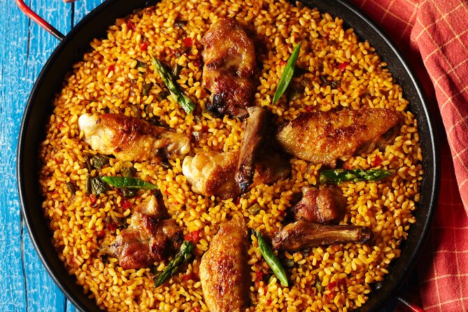 Paella Class & Bottomless Wine: Las Ramblas Views - Cooking paella above La Rambla at 6:00 pm