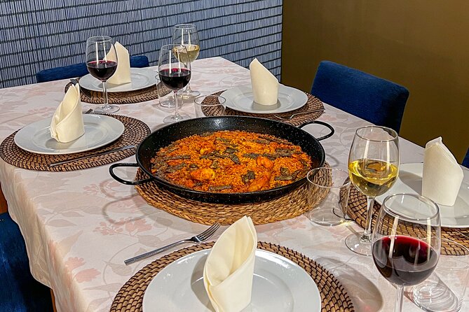 Paella Cooking Class, Wine Tasting & Central Market in Valencia - Tapas, wine, and the long-table meal