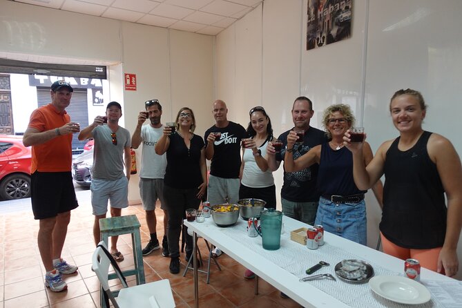 Paella & Sangria Class with Tapas and Market Visit - Timing, meeting point, and cancellation terms