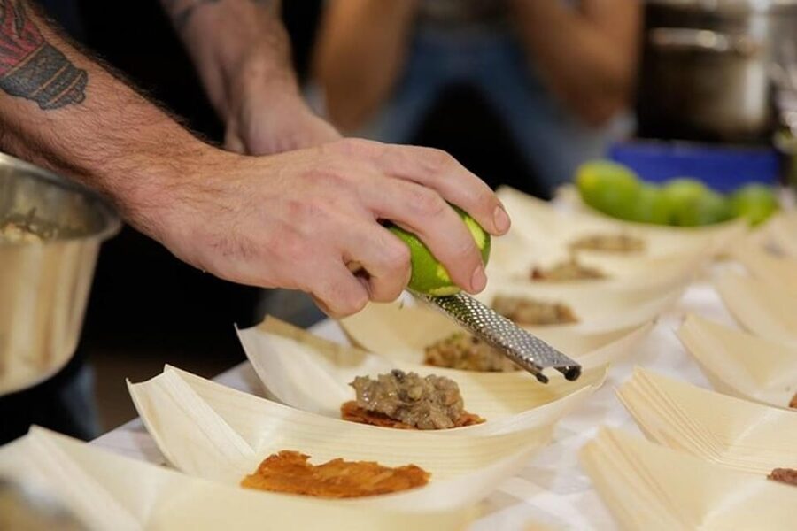 Palma: Mediterranean Cooking Class with Drinks - Chopping, sautéing, and sharing the work