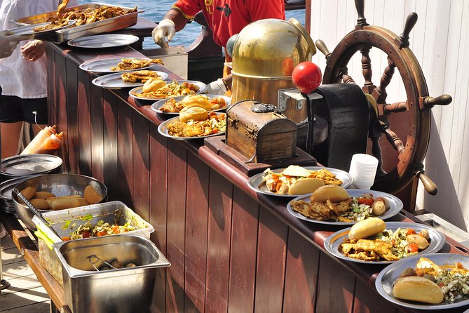 Pirate Adventure Boat Tour with Lunch in Fuerteventura - Swimming, snorkeling, and the zip line