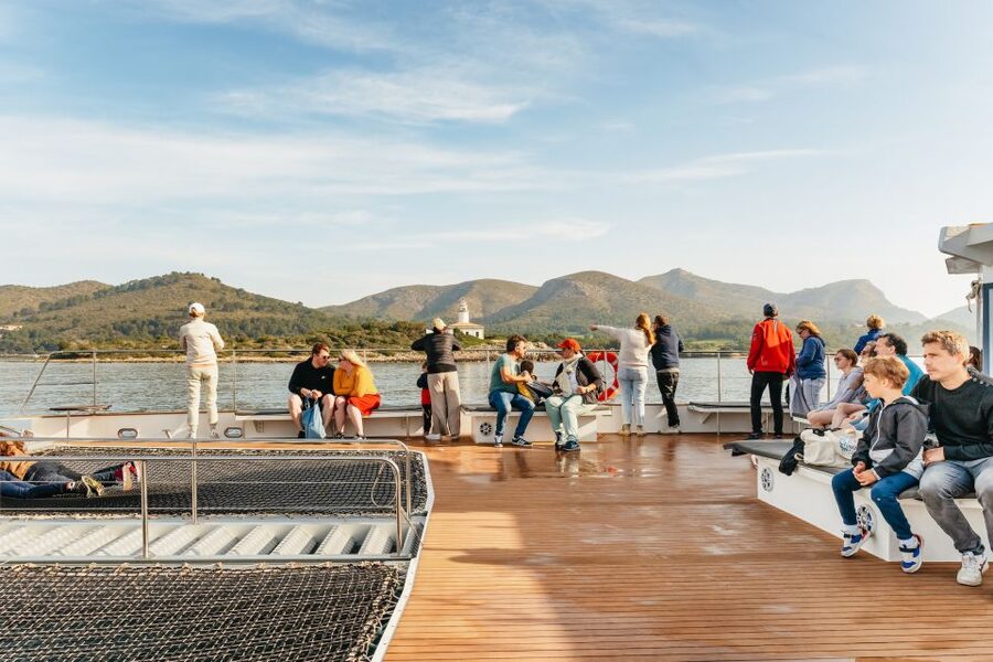 Port d'Alcudia: Sunrise at Sea & Dolphin Watching Boat Tour - Returning along the coast to Alcúdia