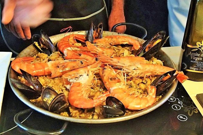 Premium Paella Cooking Class & 10 Spanish Tapas - Three dishes that you prepare yourself