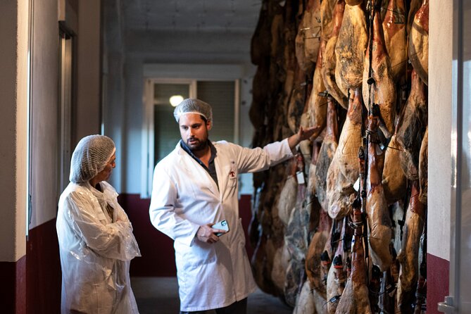 Private visit to a ham factory with show cooking in Salamanca - From Salamanca to Villares de la Reina
