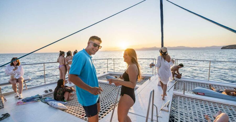 S'Arenal: Sunset Catamaran Cruise with BBQ - Palma Bay, Cap Enderrocat, and Cala Vella