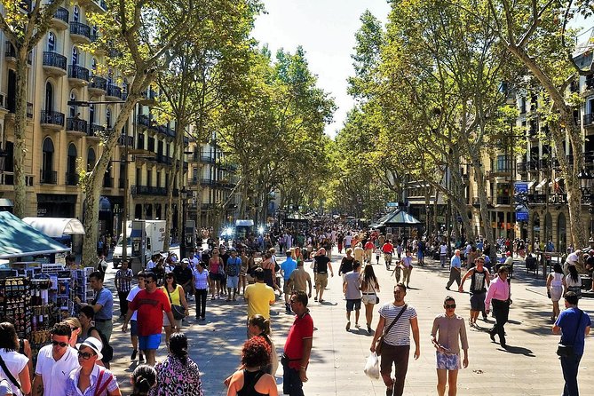Sagrada Familia & Barcelona Small Group Tour with Hotel Pick-up - Las Ramblas, La Boquería, and Barceloneta