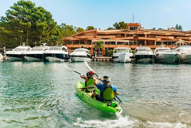 Santa Ponsa: Marine Reserve Kayak Tour - Guides, group atmosphere, and free photos