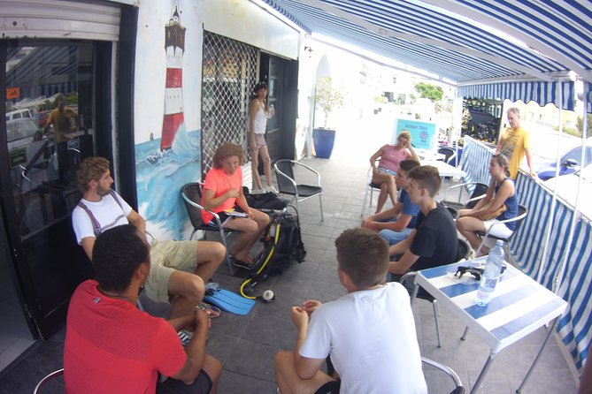 Scuba Diving Beginner's Session in Costa Adeje - Pickup, equipment, and practical timing