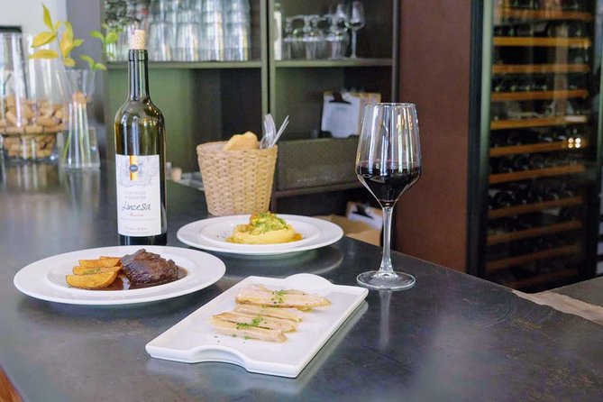 Sevilla Food Tour: Tapas, Wine, History & Traditions - Tostas and regional wine in Alfalfa