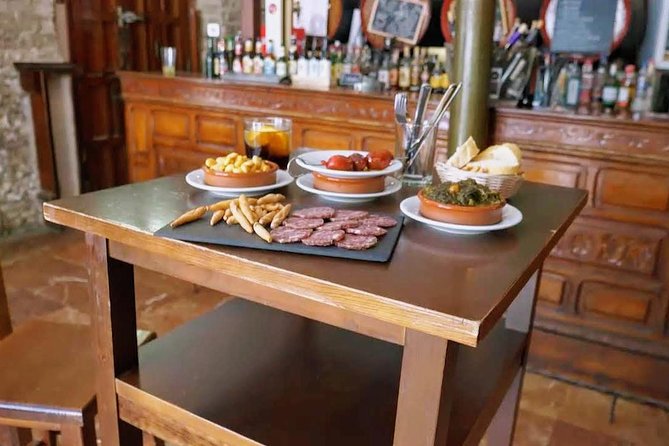 Sevilla Food Tour: Tapas, Wine, History & Traditions - Walking Seville’s old center