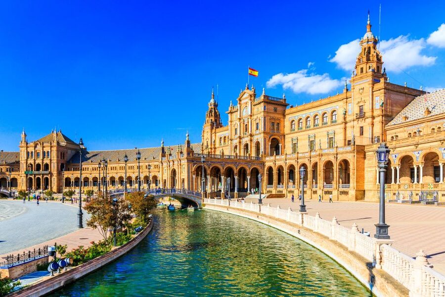 Seville: Authentic and Romantic Horse-Drawn Carriage Ride - Hotel Alfonso XIII and Seville’s grand side