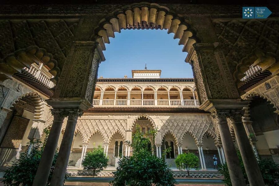 Seville: Cathedral, Giralda, and Royal Alcázar Guided Tour - The Patio de Doncellas and the palace’s layered style
