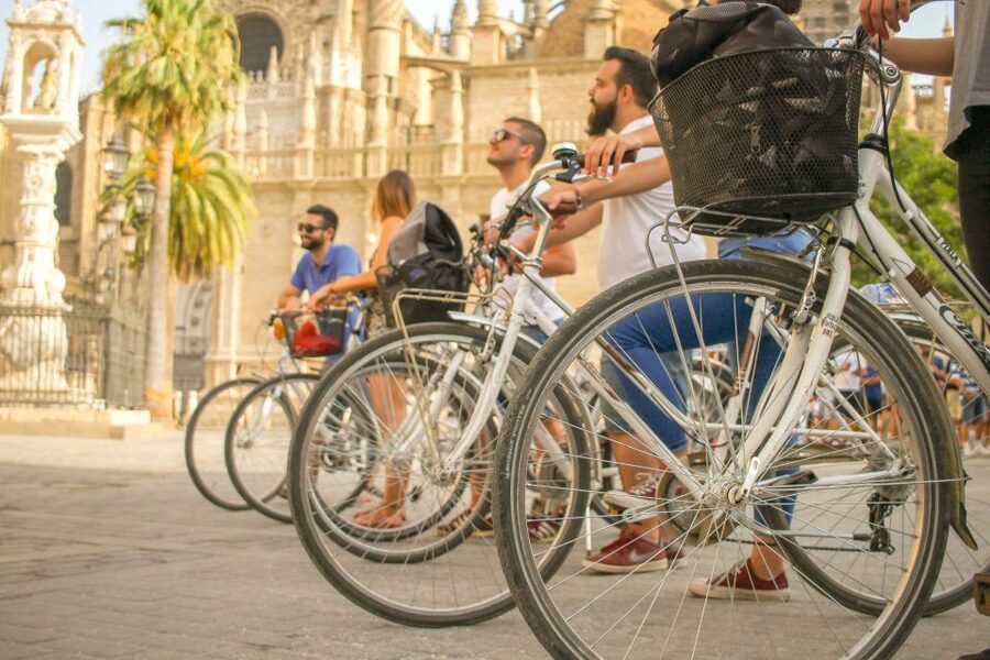 Seville: City Sightseeing and Local Culture Bike Tour - Torre del Oro and the riverfront story