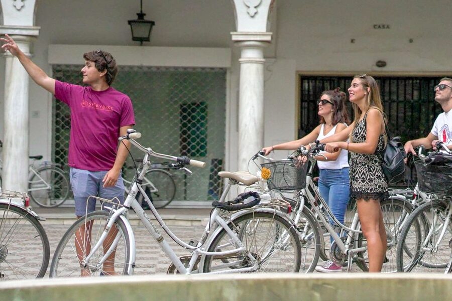 Seville: City Sightseeing and Local Culture Bike Tour - San Telmo Palace and the grand center