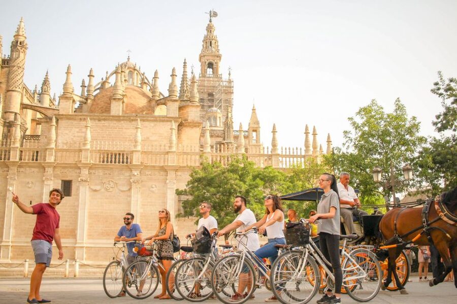 Seville: City Sightseeing and Local Culture Bike Tour - Starting inside Mercado del Arenal