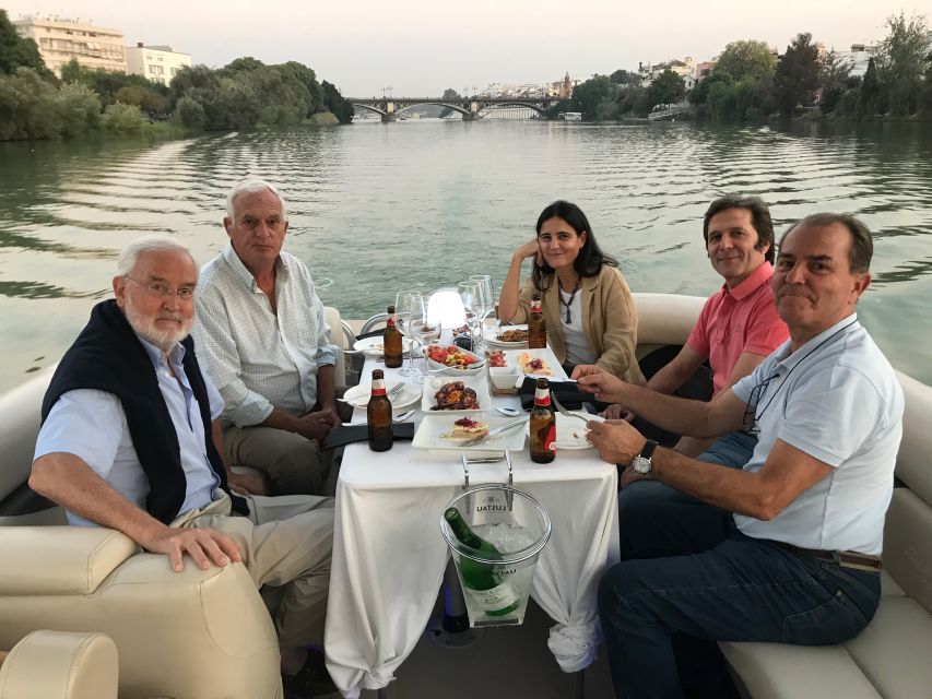 Seville: Exclusive River Boat Tour with Tapas - Tapas, sangria, and what you actually receive