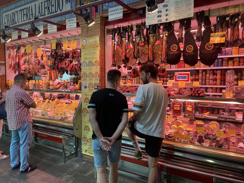 Seville: Flavors of Andalucía Guided Food Tour with Tastings - Crossing into Triana for a different Seville