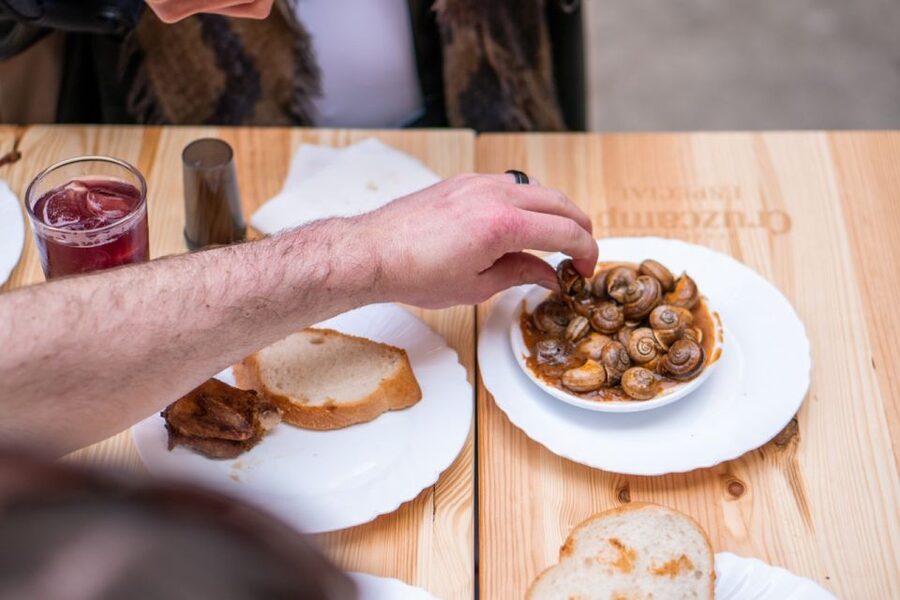 Seville: Flavors of Andalucía Guided Food Tour with Tastings - What the opening walk teaches you
