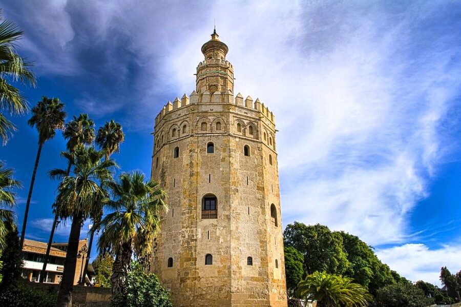 Seville: Small-Group City Highlights Walking Tour - Walking toward the Torre del Oro