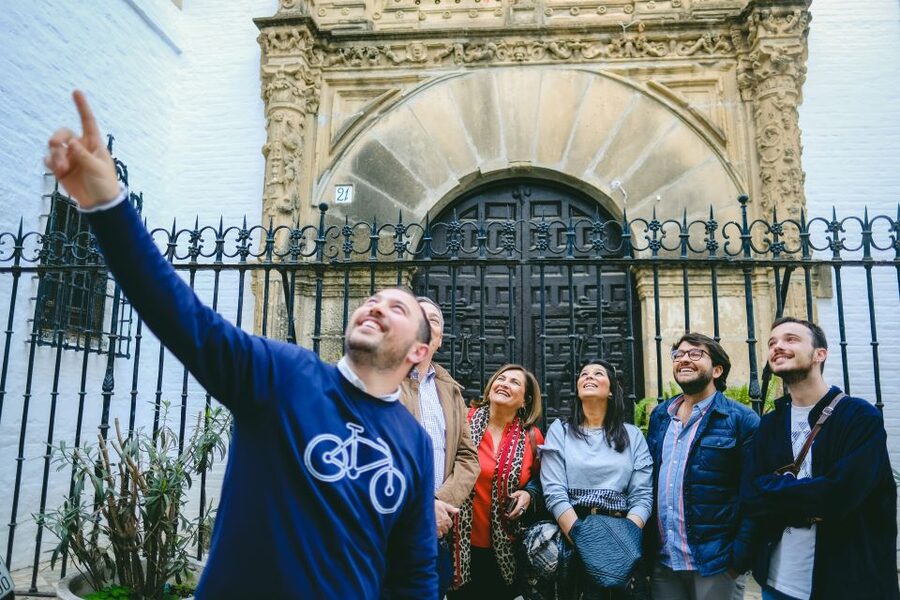 Seville: Small Group Jewish Quarter Tour with Tapas & Drinks - A three-course tapas meal in an old bodega