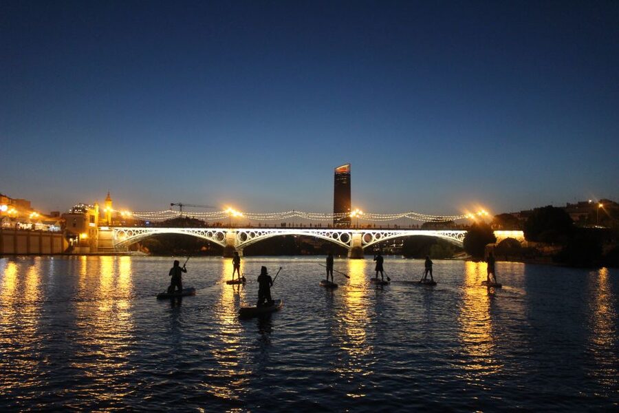 Seville: Sunset and Evening Paddle Boarding Tour - Torre del Oro and Seville after dark