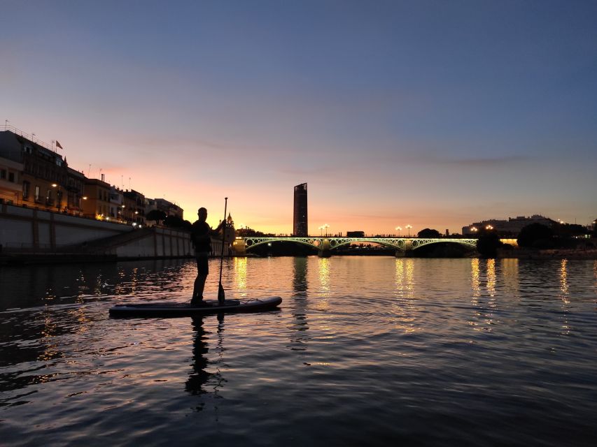 Seville: Sunset and Evening Paddle Boarding Tour - Getting comfortable on the board