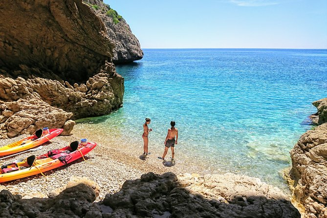 Uncharted Caves & Snorkelling Heaven: Cala Granadella Kayak Tour - Paddling along the cliffs