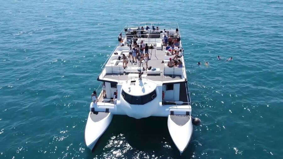 Valencia: Catamaran Cruise, Paella Lunch and Swim Stop - Lunch first: salad, chicken paella, and fruit