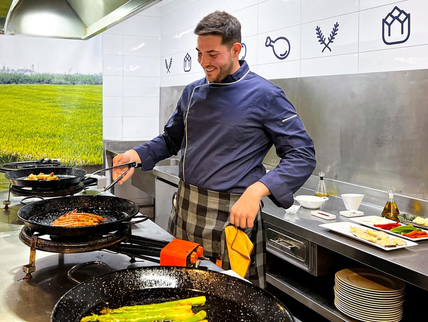 Valencia: Paella Cooking Class with Central Market Tour - Eating the paella you cooked